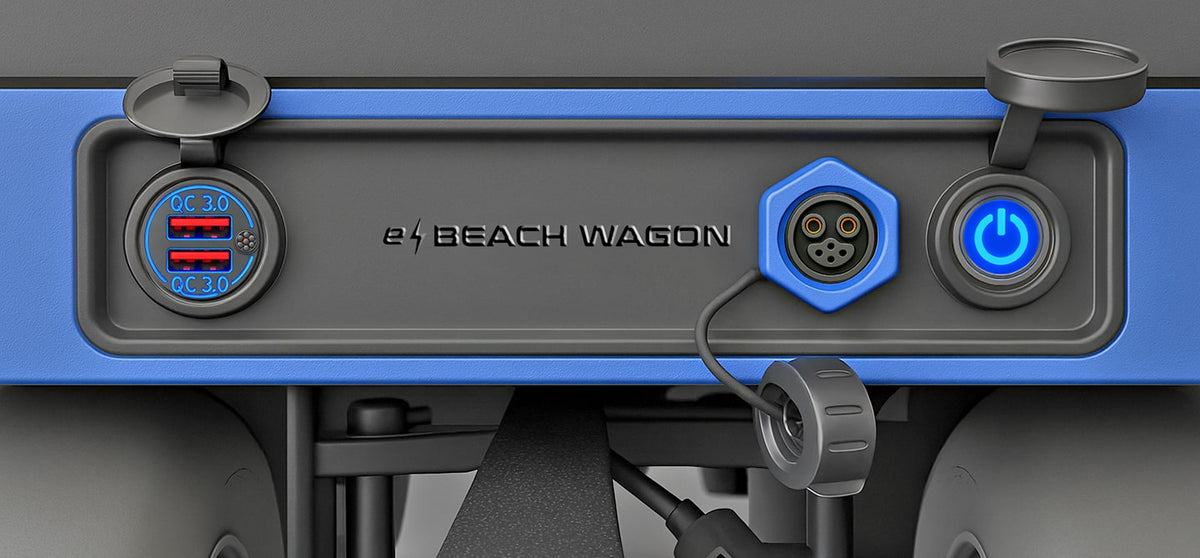 e-Beach Wagon's front control panel has two USB charging outlets, a lithium battery charger, and a power on/off switch, all protected by weatherproof covers